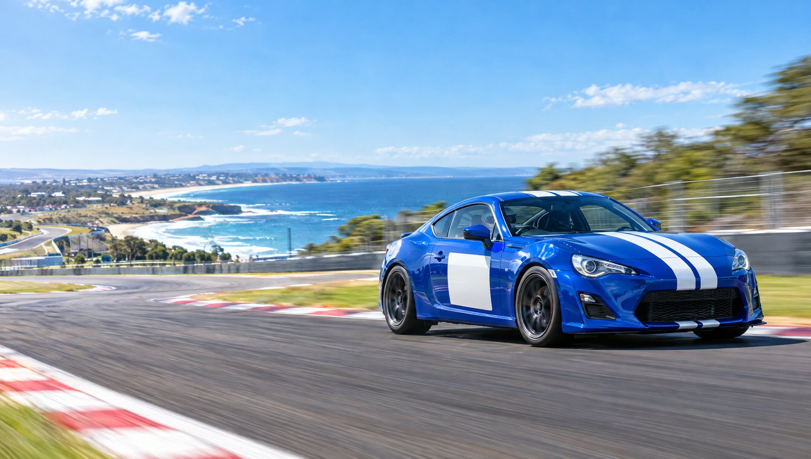 A blue 86 with white stripes on a sunny coastal circuit, from the light demo driver site